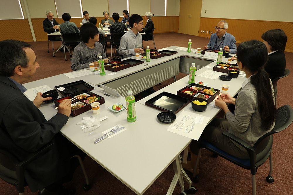 Reviewers having discussions during coffee break